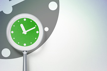 Image showing Time concept:  Clock with optical glass on digital background