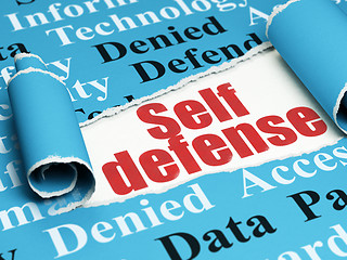 Image showing Safety concept: red text Self Defense under the piece of  torn paper