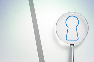 Image showing Data concept:  Keyhole with optical glass on digital background