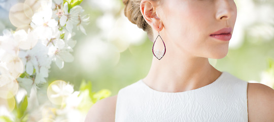 Image showing close up of beautiful woman face with earring