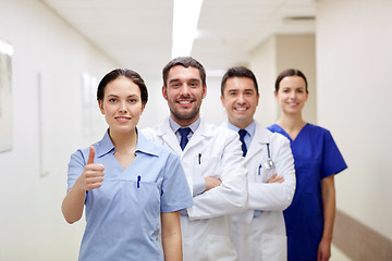 Image showing medics or doctors at hospital showing thumbs up