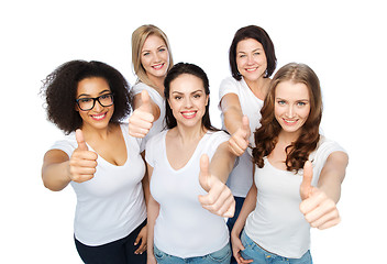 Image showing group of happy different women showing thumbs up