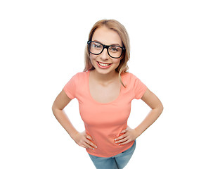 Image showing happy young woman or teenage girl in eyeglasses