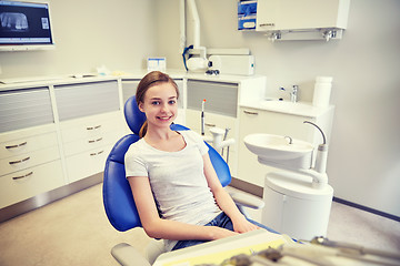 Image showing happy patient girl at dental clinic office