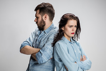 Image showing The young couple with different emotions during conflict