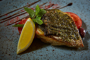 Image showing Fish dish - fried fish and vegetables