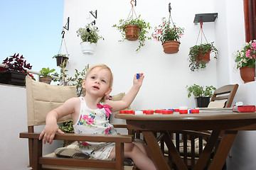 Image showing Young girl playing