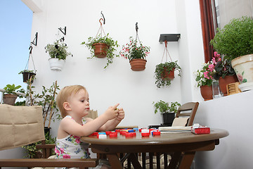 Image showing Young girl playing