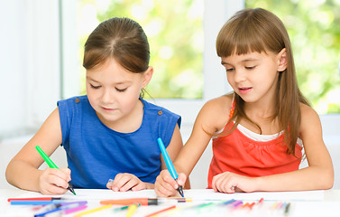 Image showing Little girls are drawing using felt- tip pens