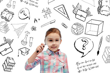 Image showing happy little girl looking through magnifying glass