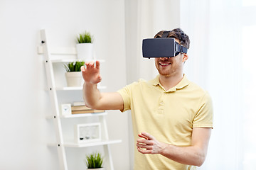 Image showing young man in virtual reality headset or 3d glasses