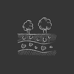 Image showing Cut of soil with different layers and trees on top. Drawn in chalk icon.