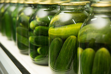 Image showing gurtsov conservation. Fresh cucumbers in jars