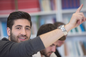 Image showing group of students  raise hands up