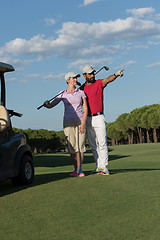 Image showing portrait of golfers couple on golf course
