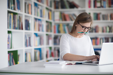 Image showing female student study in school library