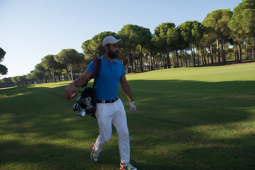 Image showing golf player walking