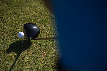 Image showing top view of golf club and ball in grass