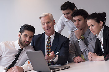 Image showing business people group on meeting at modern startup office