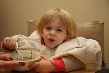 Image showing Young girl eating