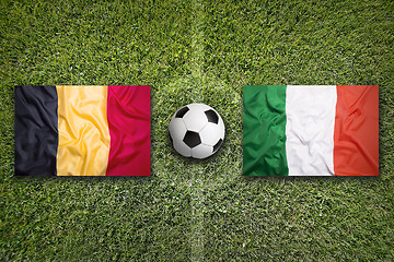 Image showing Belgium vs. Italy flags on soccer field