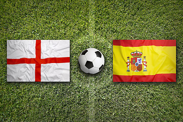 Image showing England vs. Spain flags on soccer field