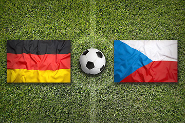 Image showing Germany vs. Czech Republic flags on soccer field