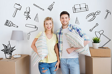 Image showing happy couple with stuff moving to new home