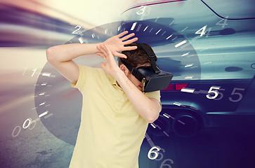 Image showing man in virtual reality headset and car racing game