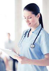 Image showing female doctor with tablet pc