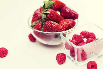 Image showing close up of ripe red strawberries and raspberries