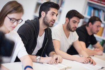 Image showing group of students study together in classroom