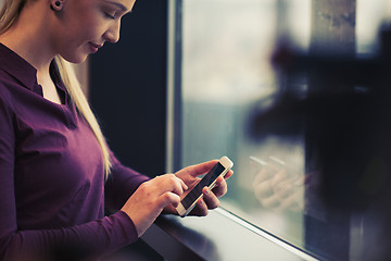 Image showing business woman using smart phone at office