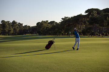 Image showing golfer hitting long shot