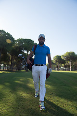 Image showing golf player walking