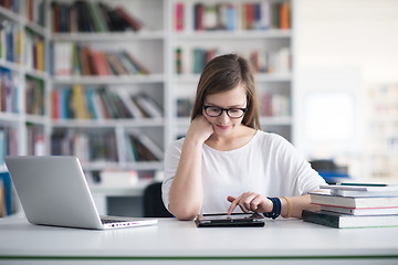 Image showing female student study in school library