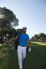 Image showing golf player walking