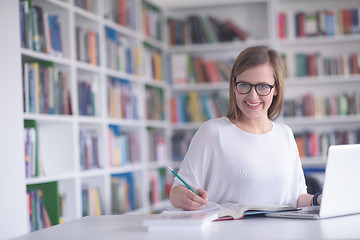 Image showing female student study in school library