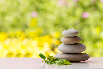 Image showing Pile of balancing pebble stones outdoor