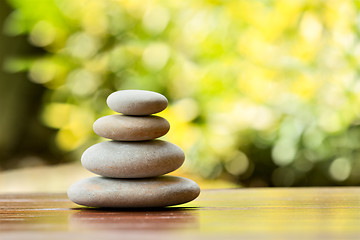 Image showing Pile of balancing pebble stones outdoor