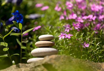 Image showing Pile of balancing pebble stones outdoor