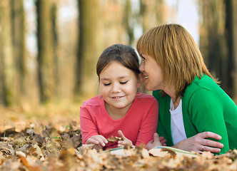 Image showing Mother is talking to her daughter