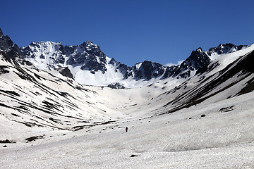 Image showing Hiker in snowy mountains at nice day