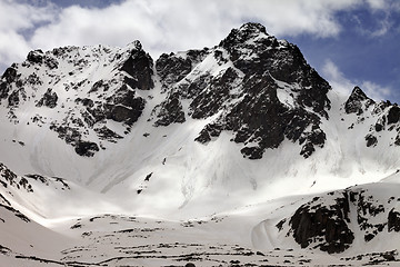 Image showing Snowy rocks with traces from avalanches