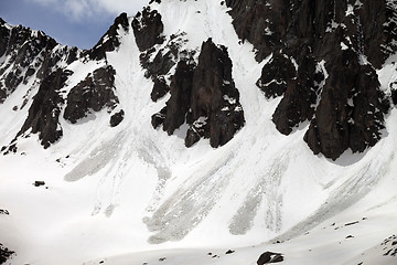 Image showing Snowy rocks with traces from avalanche