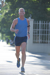 Image showing handsome senior man  jogging