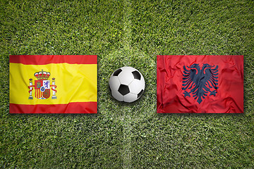 Image showing Spain vs. Albania flags on soccer field