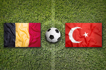 Image showing Belgium vs. Turkey flags on soccer field