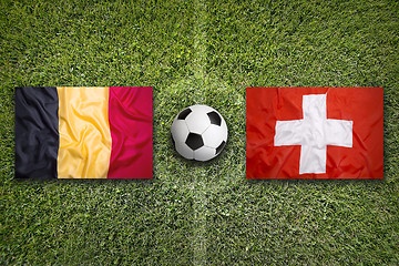Image showing Belgium vs. Switzerland flags on soccer field
