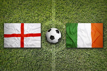 Image showing England vs. Ireland flags on soccer field